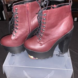 A burgundy/maroon pair of boot heels. Size 7.5. A Soda design